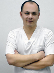 Стоматолог-хирург, имплантолог Евгений Викторович Васильев