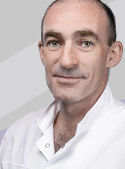 Имплантолог, стоматолог Михаил Аркадьевич Слуцкий