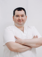 Имплантолог, пародонтолог Евгений Анатольевич Рыбаков