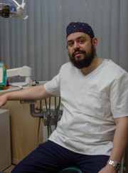 Имплантолог, стоматолог Антон Давидович Косневич