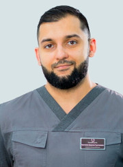 Имплантолог, стоматолог Арзуман Султанович Рустамов