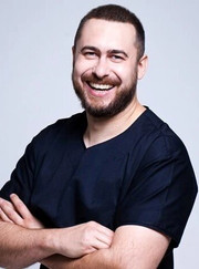 Имплантолог, стоматолог-ортопед Александр Борисович Беленький