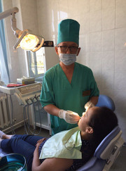 Стоматолог Ерланбек Сакенович Токтаров